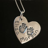 Large heart double handprint necklace