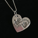 Large heart double handprint necklace