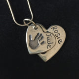 Hands and Feet Double Descending Heart Pendant